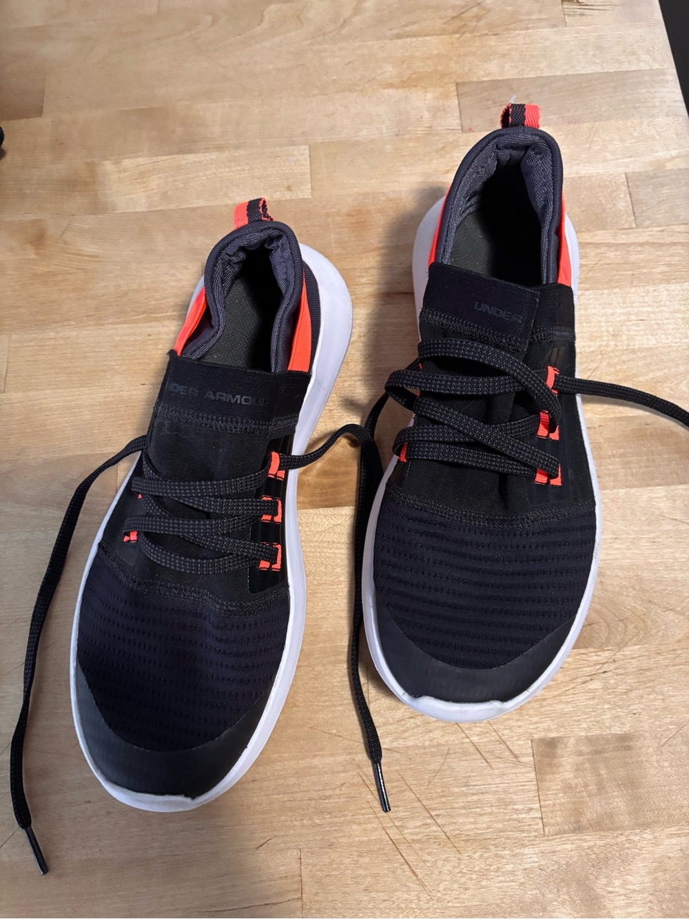 Under Armour Black Sneakers with Orange Accents